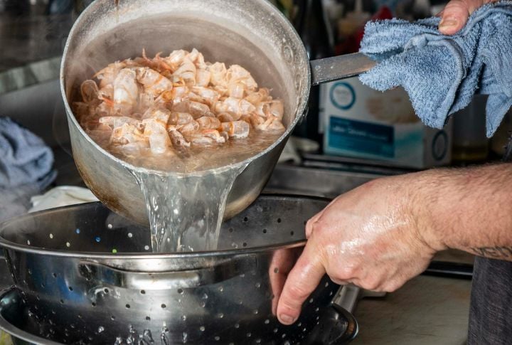 Strain The Broth For A Smooth Finish